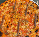 BASSA, la pizza romana torna alle origini (e il calzone si prende la scena)